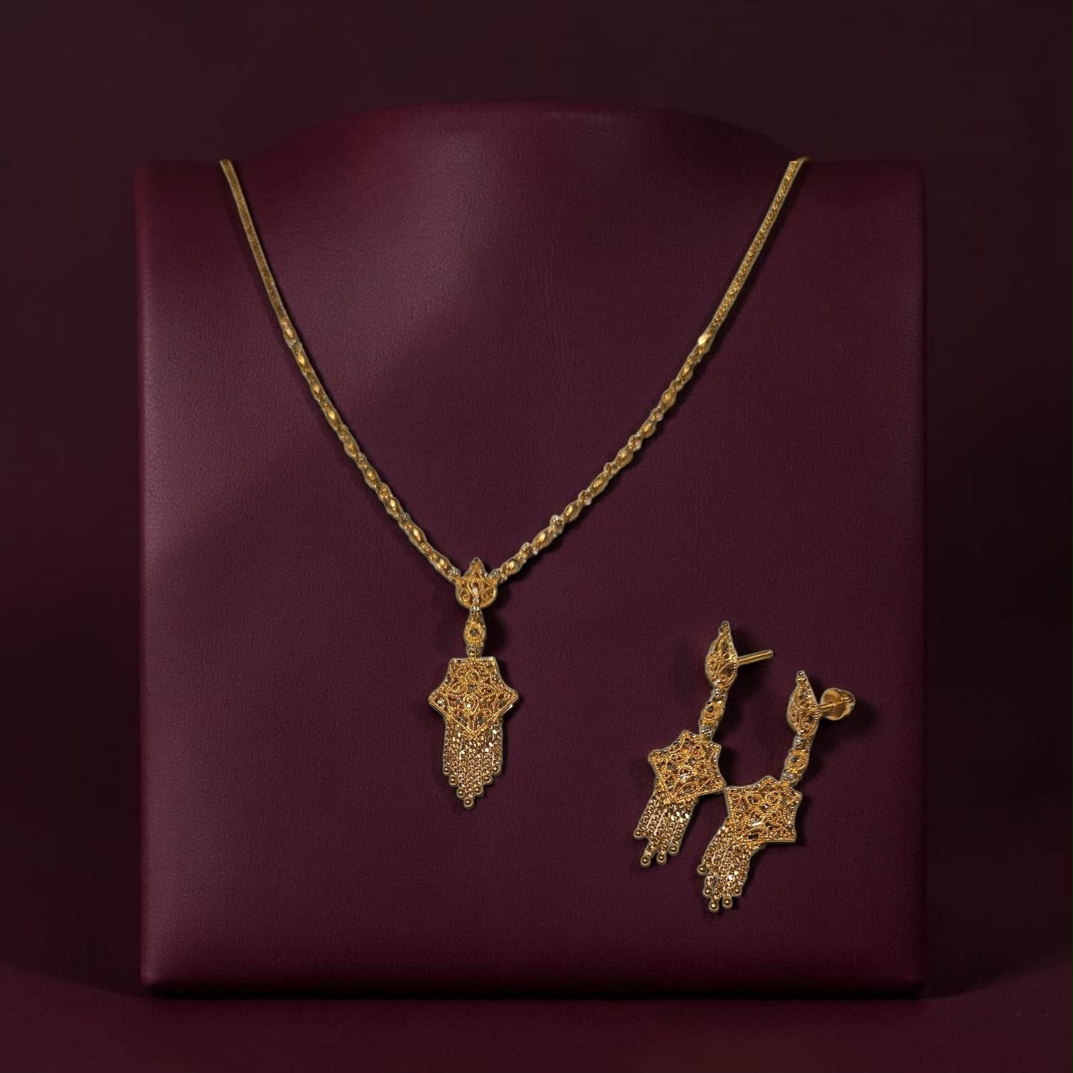 Gold necklace and matching earrings